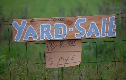 yard sale sign to promote ways to earn cash