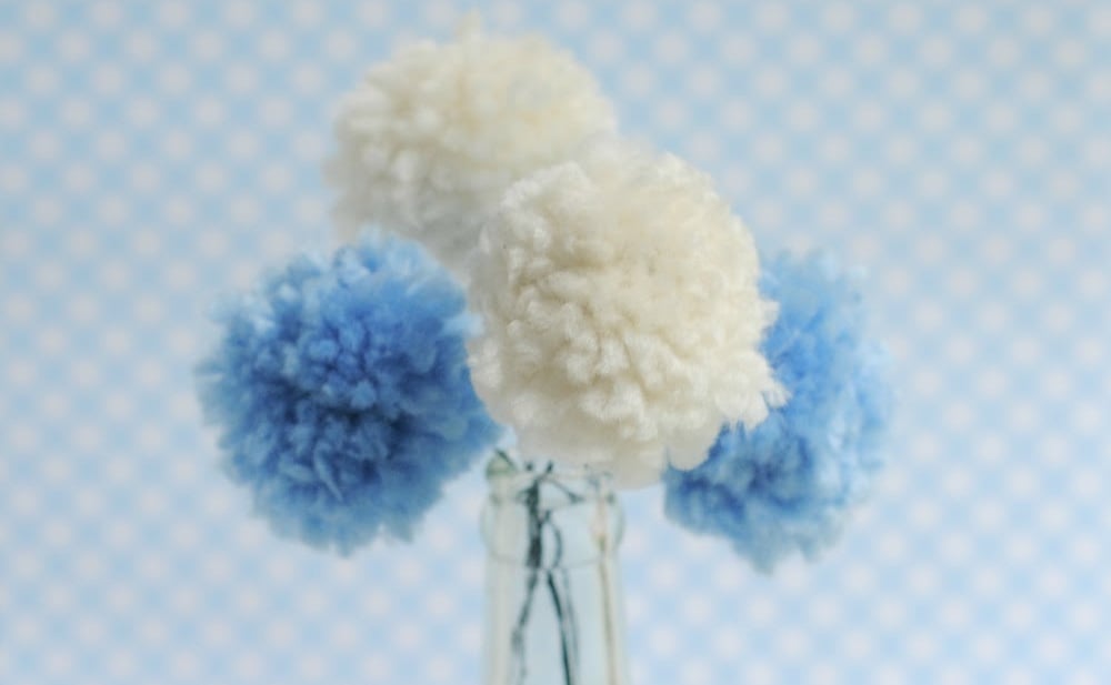 Not sure what to give as baby shower thank you gifts? How about making a DIY gift like these pretty pom pom flower bouquets.